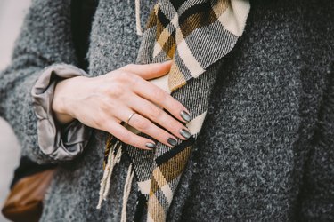 Close-up of woman in coat and scarf