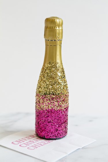 Ombre glitter champagne bottle.