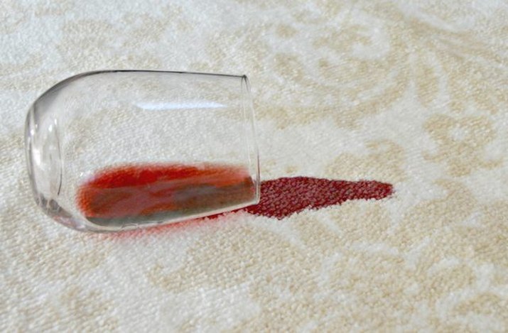 Dreaded red wine on white carpet