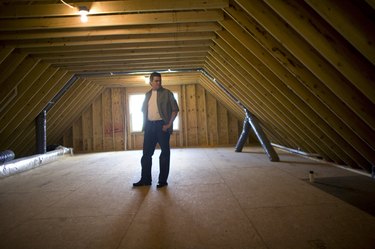 Man in empty attic