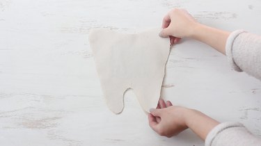 Placing right sides of pillow pieces together