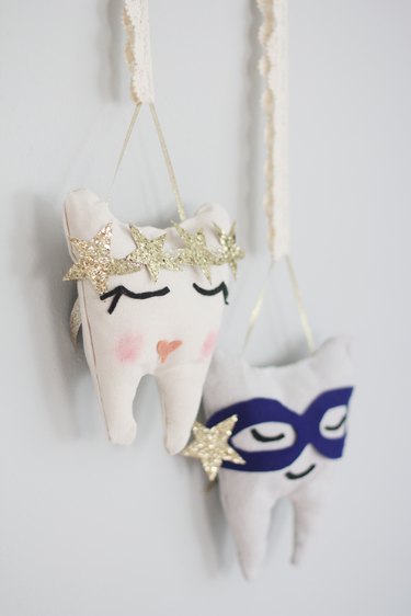 Two hanging tooth fairy pillows