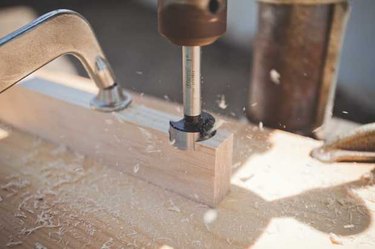 Cutting the cross braces with a Forstner