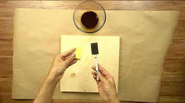 Paint sponges for applying coffee wood stain.