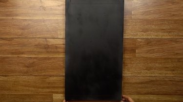 DIY chalkboard serving tray, primed and painted prior to removing masking tape.