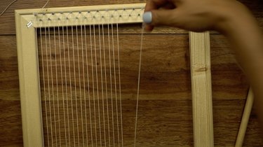 Warping a loom for an easy DIY woven wall hanging.