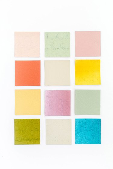 Create a cohesive color palette using paint chips.