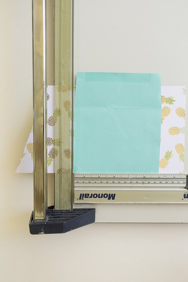Paper cutter and envelope.