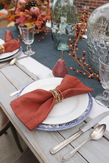 Gold wire napkin ring on a fall tablescape