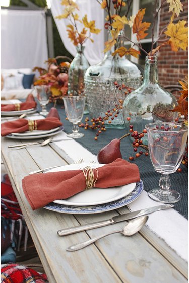 Fall tablescape with gold wire napkin rings.