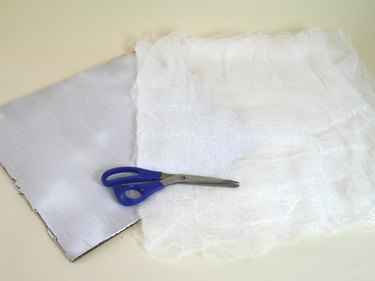 10 layers of cheesecloth, a pair of scissors and a 15-by-15 board.