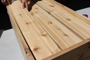 lay out three 34 1/4" wood planks | how to make an elevated planter box