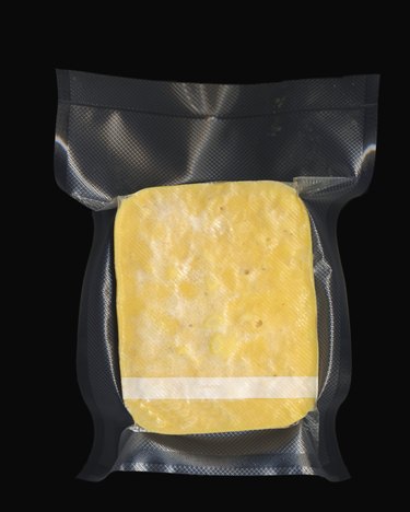Frozen vacuum sealed block of macaroni and cheese